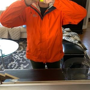 Like new women’s orange rain jacket north face